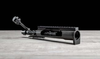 The Kelbly's Atlas Tactical 338 Lapua action Bolt Face is a Remington semi-clone action, featuring a side bolt release and trigger hanger. There is little modification necessary to use a Remington 700/40x stock or chassis. This action utilizes a .750” diameter bolt and Sako extractor to safely fit the .338 cartridge into a 700 footprint. We made the most rugged action possible for practical, tactical, or hunting. We use a Black Nitride finish from H&M Metal Processing. This allows you to use this action “dry” or without lubrication for extreme environments. As always it is best to use lubrication in normal day to day shooting. In addition to the Black Nitride process we use a fluted bolt, to help move dirt into the flutes allowing better function of the action. We cut the magazine well to use the Accuracy International single stack magazines and will also work with the Wyatt’s MBE-3 ADL/BDL Box. One of the key features of this action is the TG ejector, it is a mechanical ejector that does not put any chamber pressure on the round. It is also a “never fail” setup, meaning that there are no springs to get gummed up and stop working. We offer an Extreme Duty Bolt Stop, that bolts to the side of the action via a 6/48 screw. It is truly the most reliable bolt stop upgrade on the market! We finish it all off with a dual-pinned 20 MOA Picatinny 1913 MIL-SPEC rail fastened with 8-40 screws, a dual pin recoil lug, and a tactical bolt knob. Check out our other Bolt actions